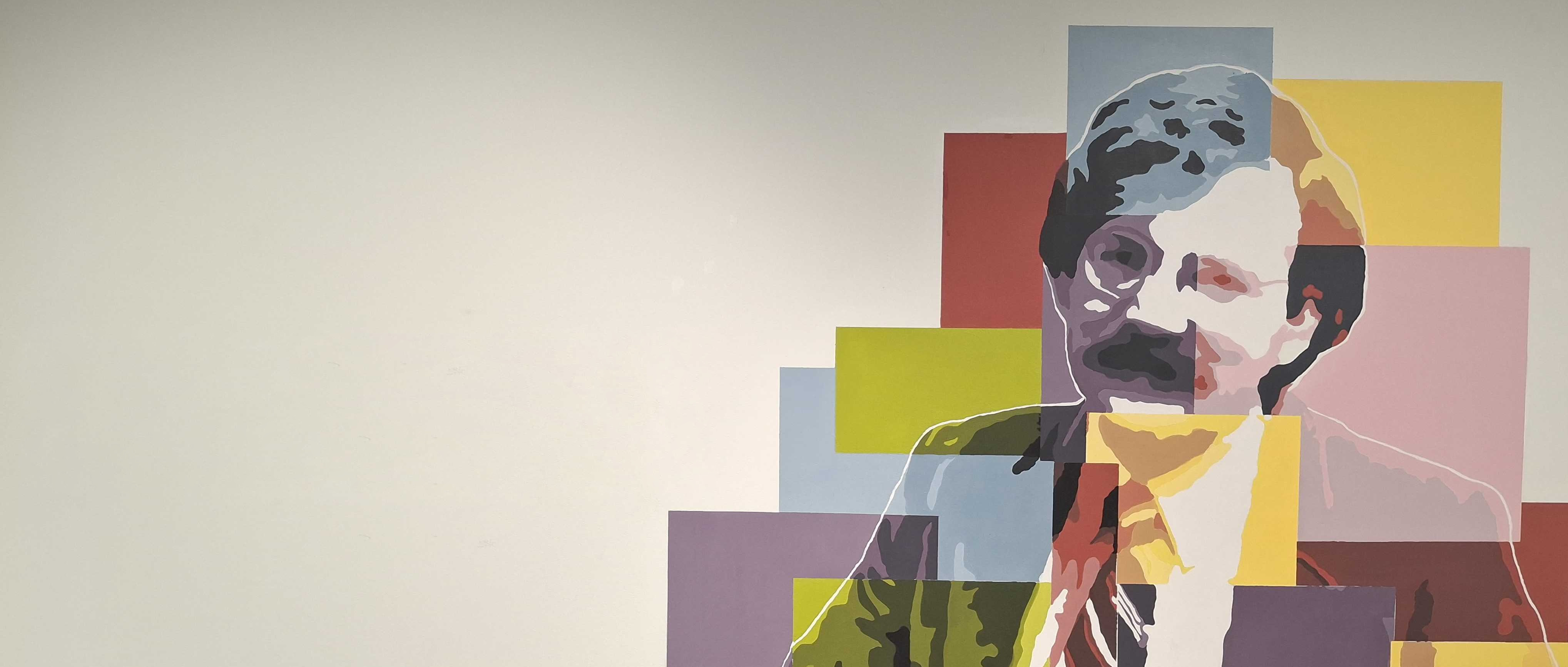 Colorful mural of Roy Rosenzweig located within the Roy Rosenzweig Center for History and New Media