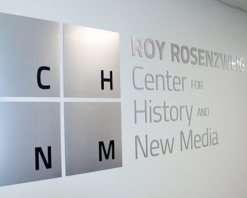 CHNM wall signage showing the letters C, H, N, M and the full name Roy Rosenzweig Center for History and New Media.