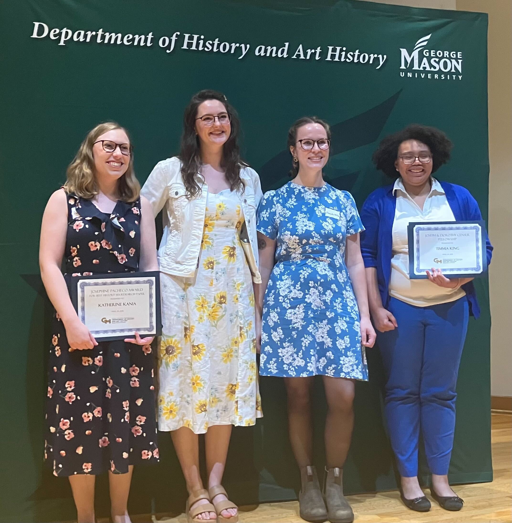 Katie, Rae, Alexandra, and Timmia at an award ceremony, April 2025